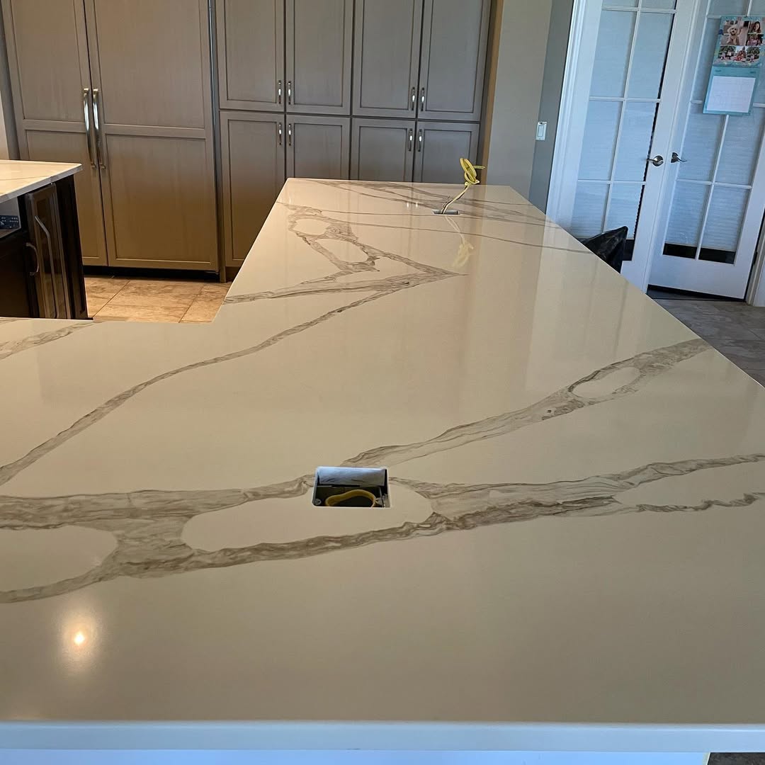 White Marble Kitchen Island with Waterfall Edge